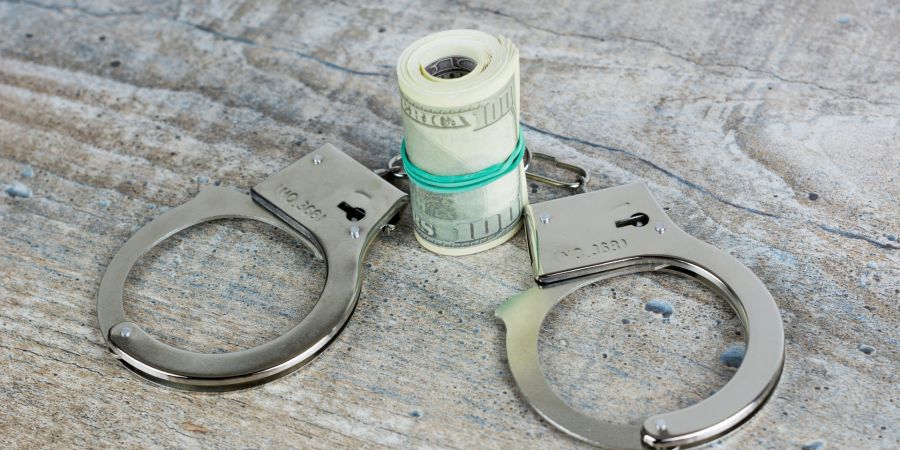 handcuffs, money
