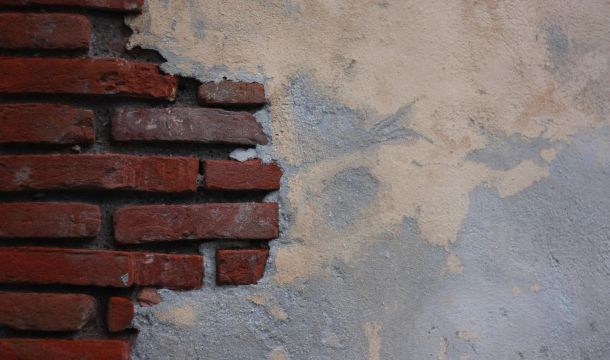 a brick and plaster wall