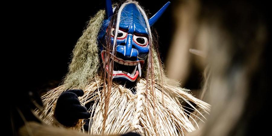 promo graphic, masked character