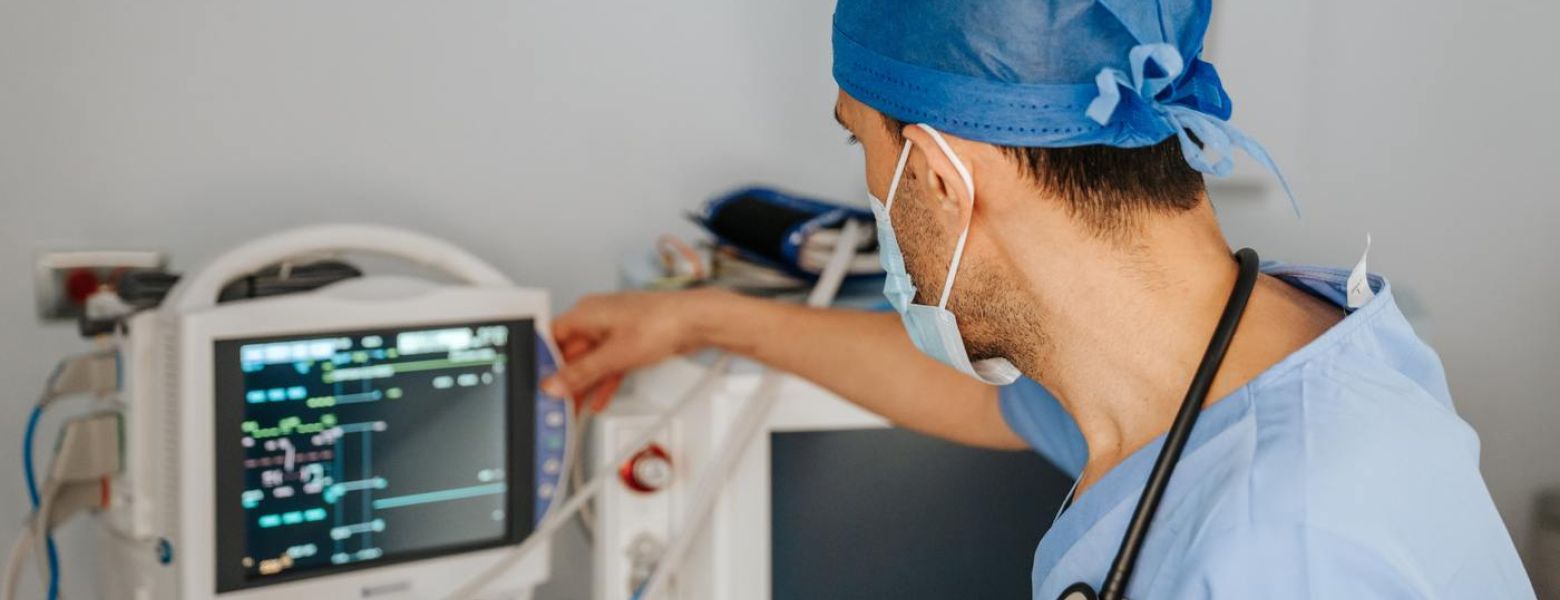 a doctor views vital signs