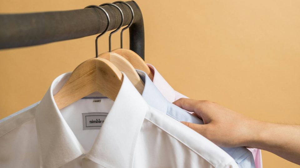white collar shirt in a closet