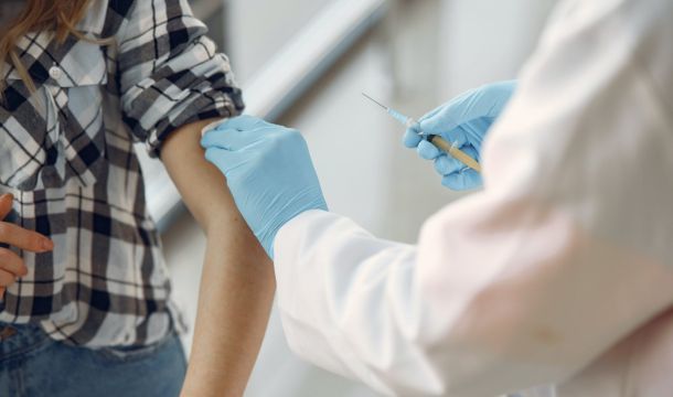 woman receiving a vaccine