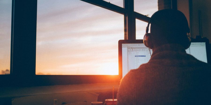 a person in an office working late into the night
