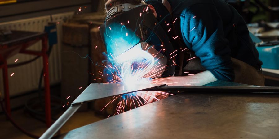 welding metal together, indoors