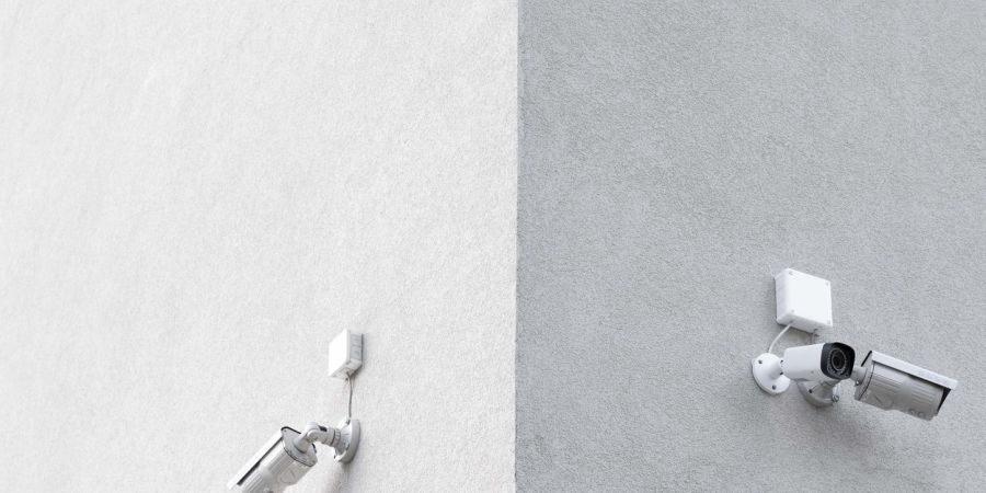 surveilance caeras on outdoor wall