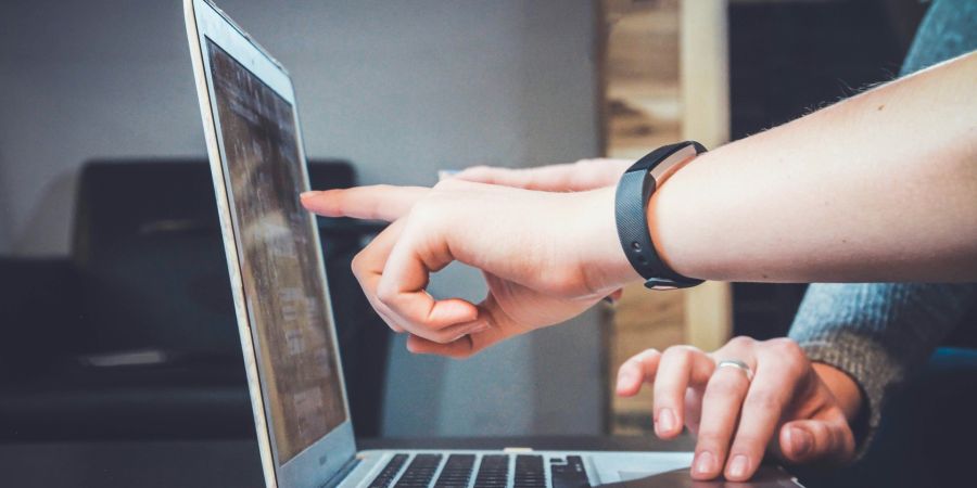 pointing to computer