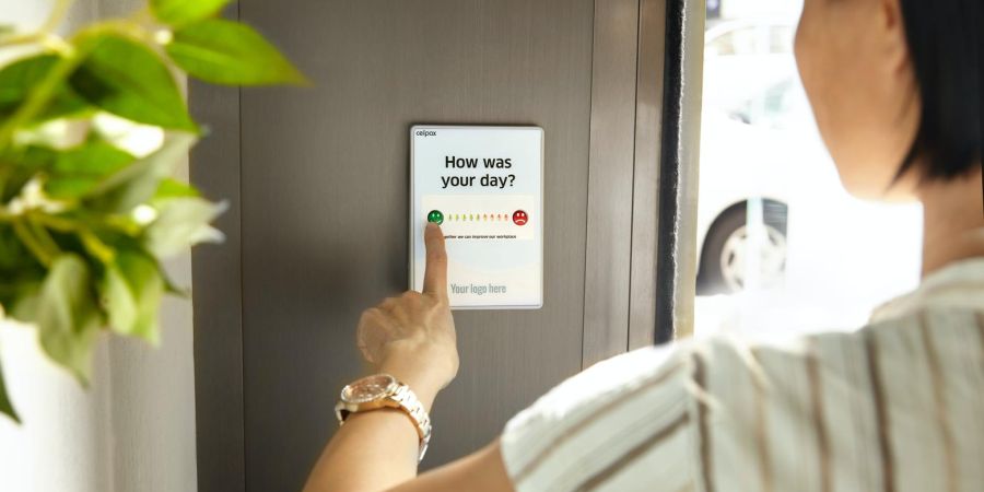 woman indicating her moral for the work day