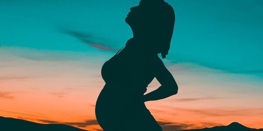 Pregnant Woman Looking at the stars