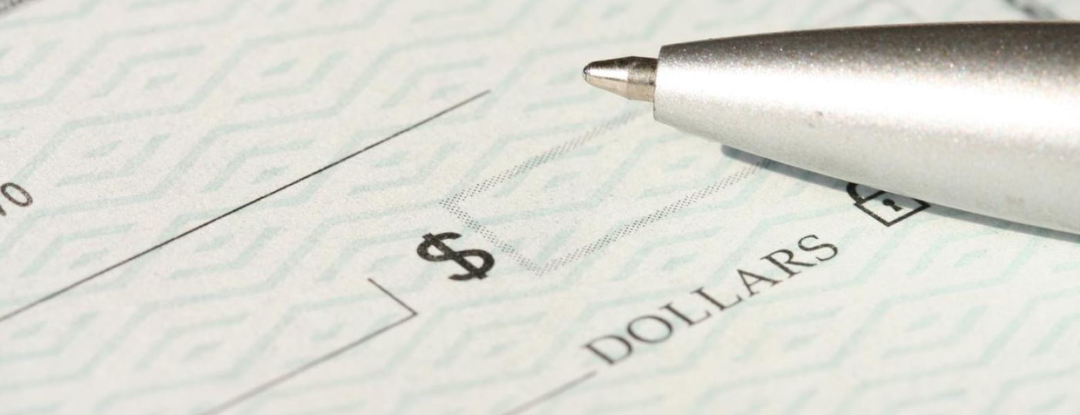 check with a pen on it