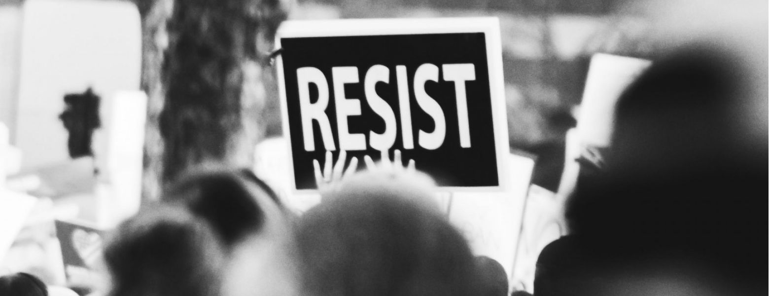 protesters with resist sign