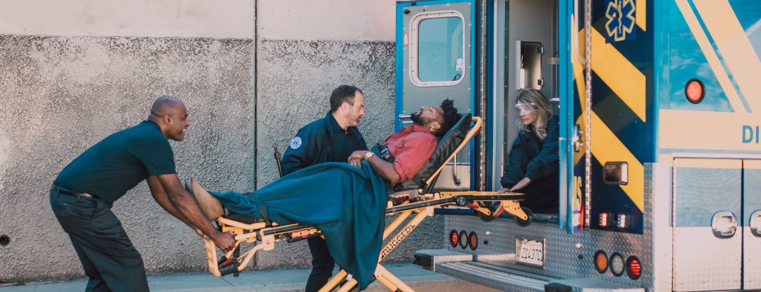 loading person up on an ambulance