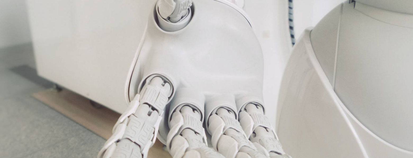 white robot hand, indoors