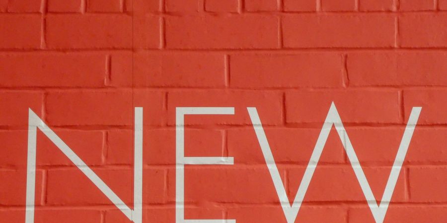 new painted on red brick wall