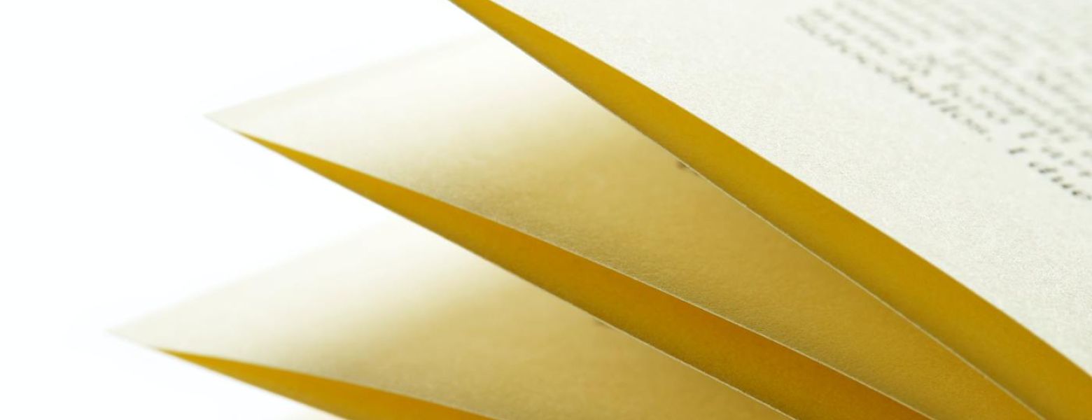 pages of a book fanning out, indoors