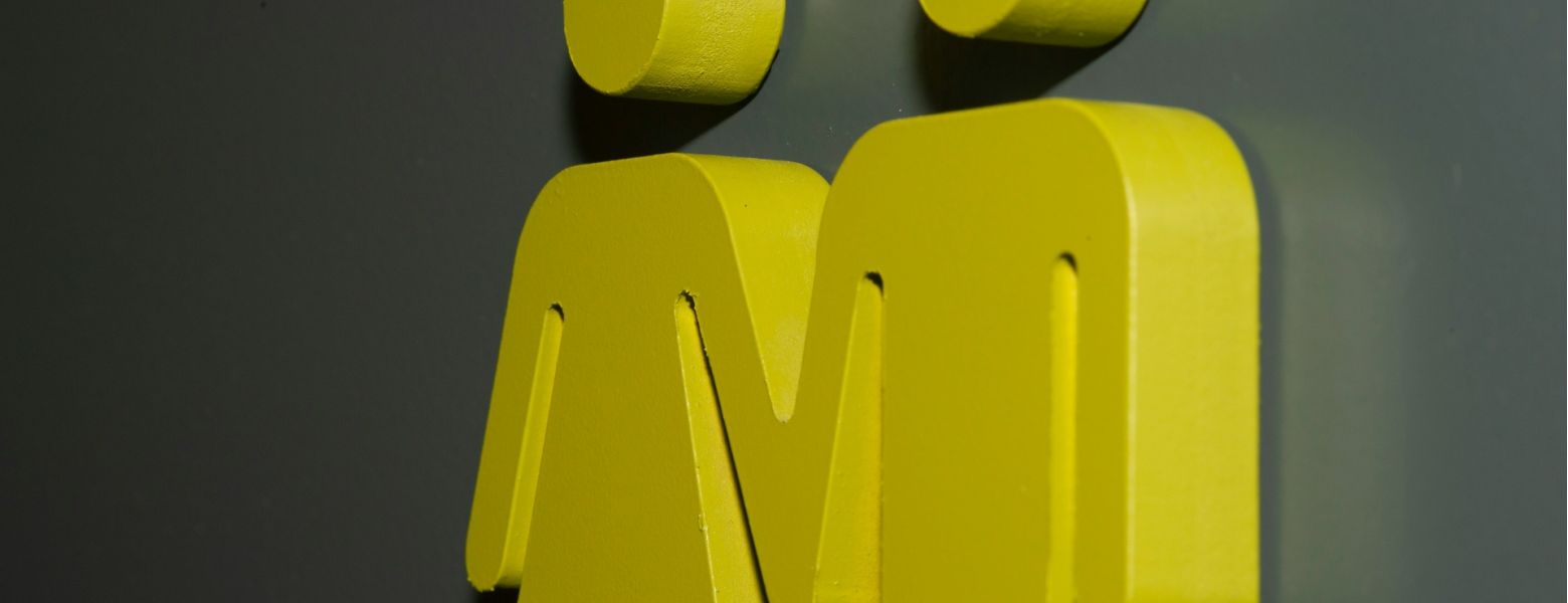 gender neutral bathroom sign