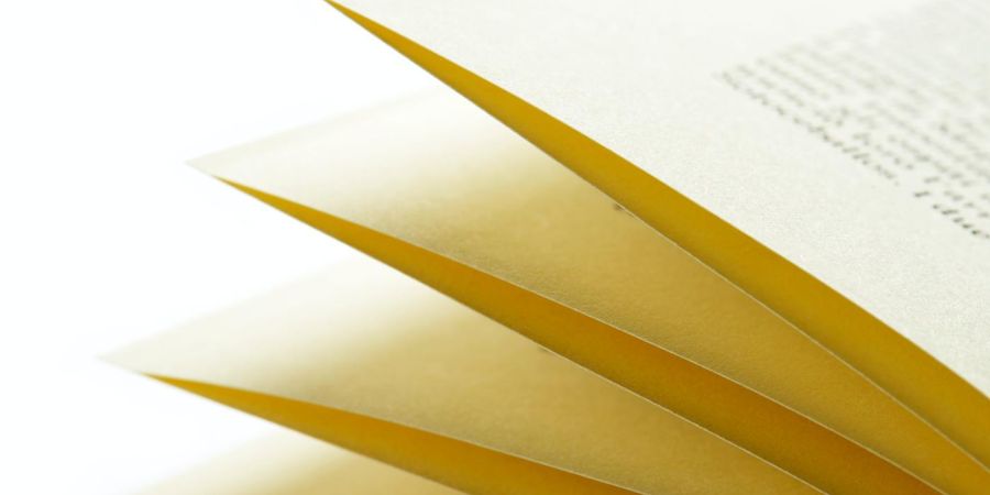 pages of a book fanning out, indoors