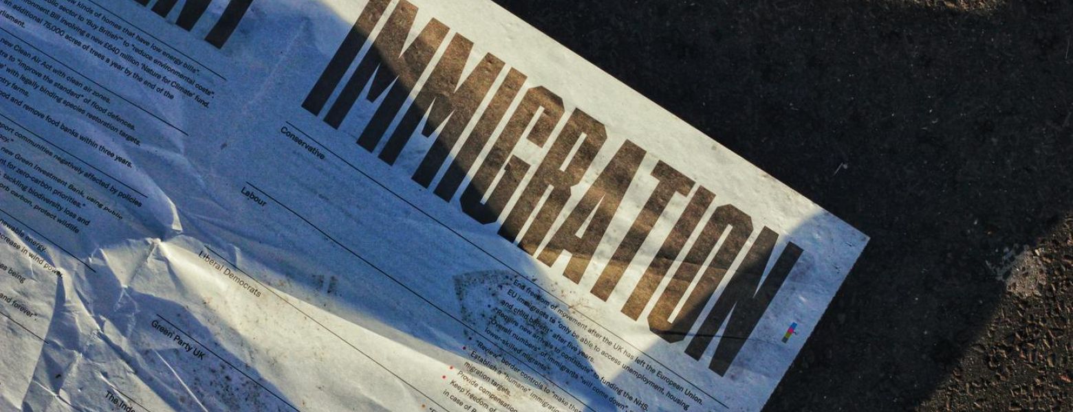 immigration paper on the ground, outdoors