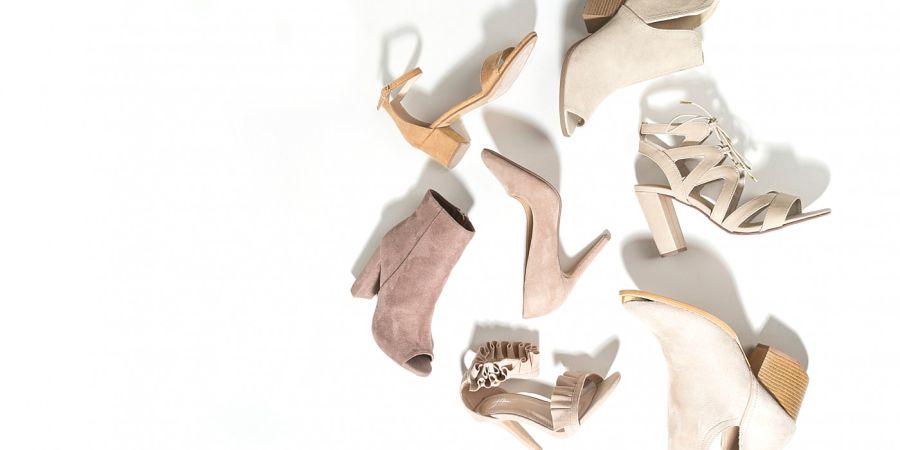 Collection of shoes over a white background