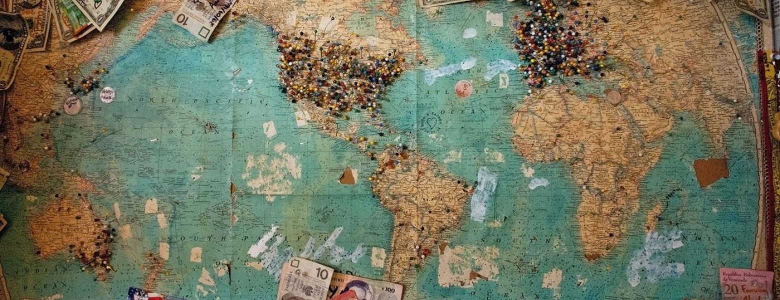 a world map with money