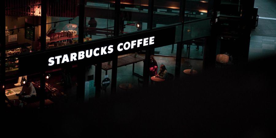 starbucks coffee storefront, night