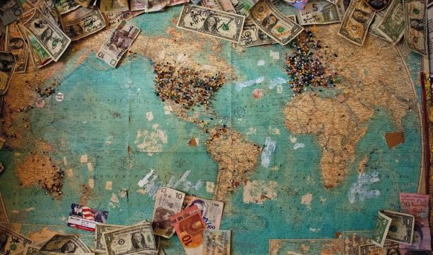 a world map with money