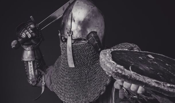 armored man, with sword and shield