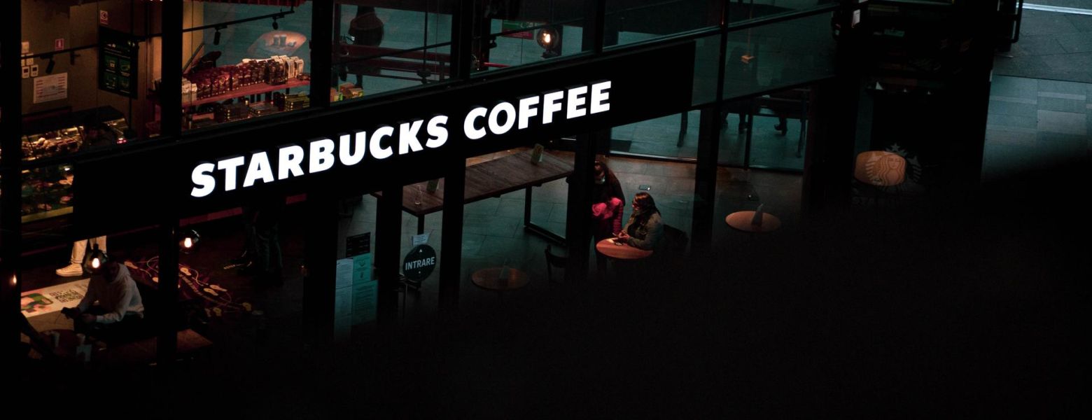 starbucks coffee storefront, night