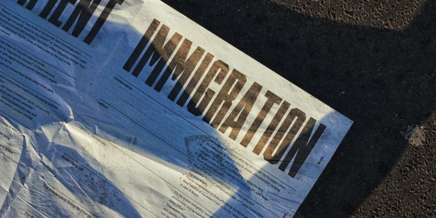 immigration paper on the ground, outdoors