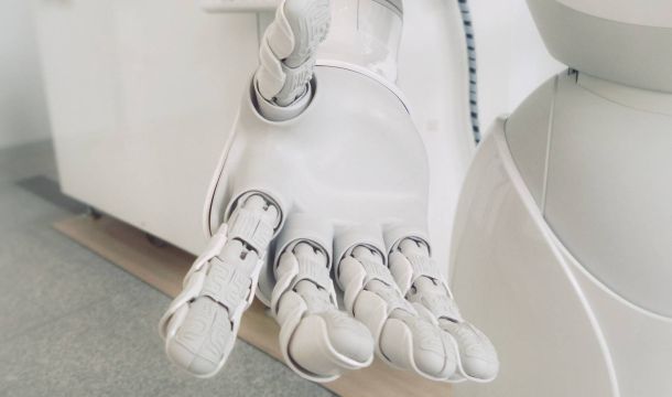 white robot hand, indoors